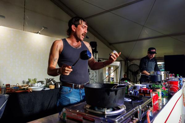 Outback Tom cooking on stage