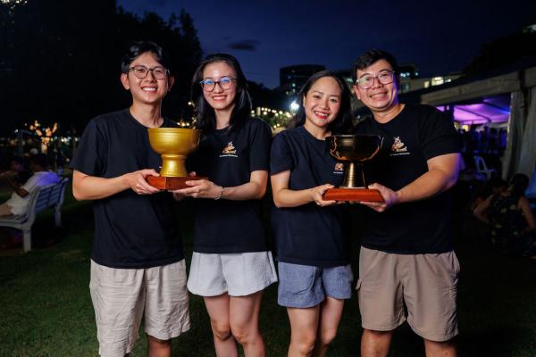The Meeting Place Katherine team holding their two trophies